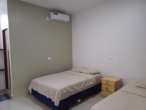 Postel nebo postele na pokoji v ubytování Casa Puka