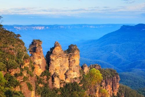 a group of tall rocks in the blue mountains at Blue Haven Retreat - Glenmore Park Pool Home in Glenmore Park