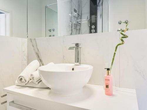 a bathroom with a white sink on a counter at Apartment in Bad Camberg near Taunus Mountains in Bad Camberg