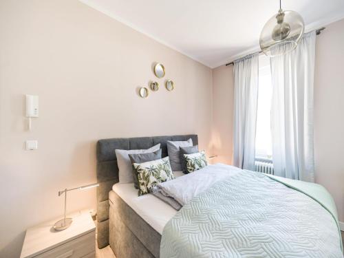 a bedroom with a bed and a window at Apartment in Bad Camberg near Taunus Mountains in Bad Camberg