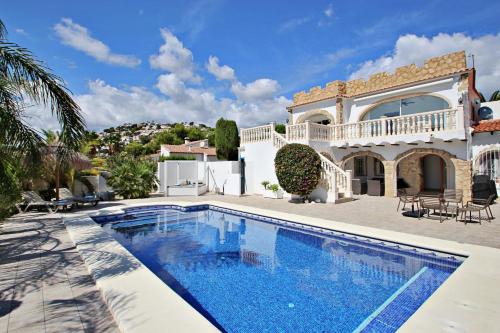 Kolam renang di atau dekat dengan Mandala - sea view villa with private pool in Costa Blanca