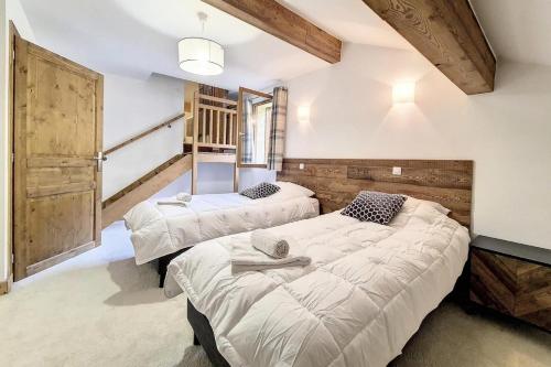 Postel nebo postele na pokoji v ubytování Résidence Le Bettex - Chalet CRISTAL MAE-0654