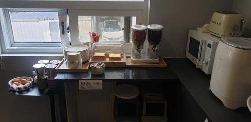 Køkken eller tekøkken på JI Boutique Hotel