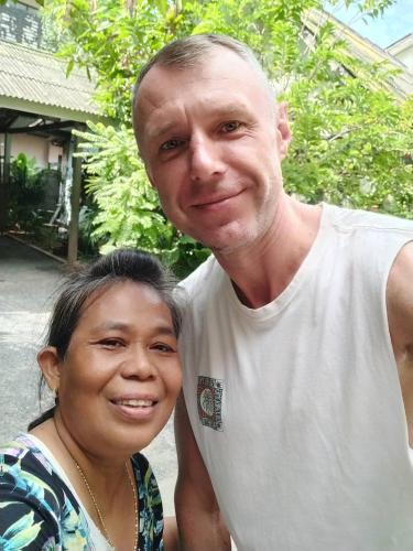 a man and a woman posing for a picture at Bonny Hotel 4 Floors No Elevator in Lamai