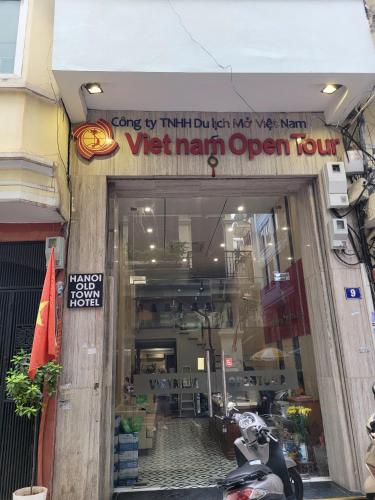 a sign for a viet main open room at Hanoi Old Town in Hanoi