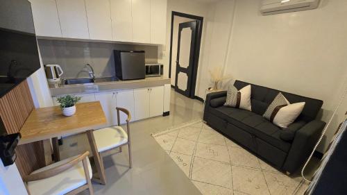 Η κουζίνα ή μικρή κουζίνα στο Flat 35, Unit D