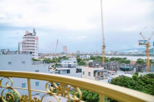 a view of a city from a balcony at Dragon Hotel & Apartments Đà Nẵng in Da Nang