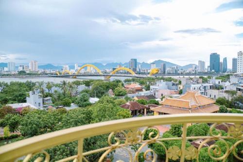 a view of a city from a balcony at Dragon Hotel & Apartments Đà Nẵng in Da Nang