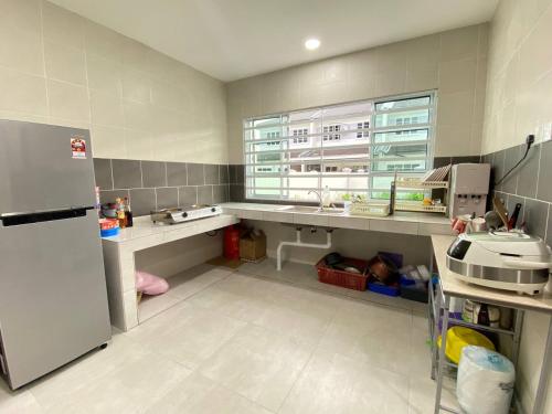 Kuchyň nebo kuchyňský kout v ubytování ZALFIA Homestay