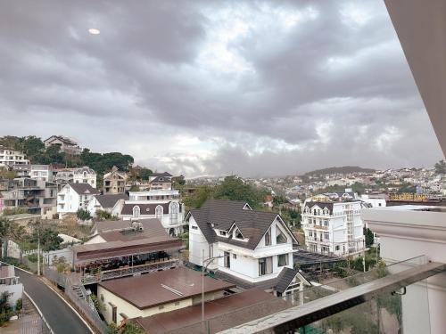 a view of a city with white houses at L'amour Stay Dalat in Xuan An