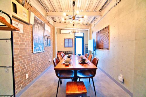 a conference room with a long table and chairs at Tokyo Oasis Heiwajima in Tokyo