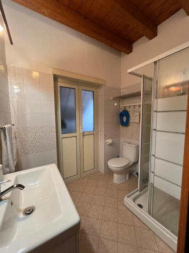 a bathroom with a sink and a toilet at Fikus APT relax Castello Ursino in Catania