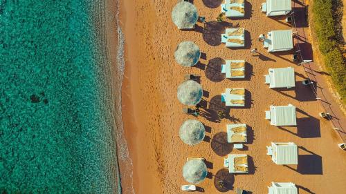 an aerial view of a beach with houses and the ocean at Domina Coral Bay Resort, Diving , Spa & Casino in Sharm El Sheikh