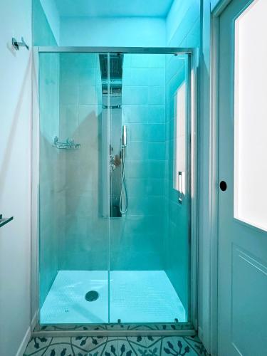 Un baño de VOLPE E UVA Winesuites & Spa