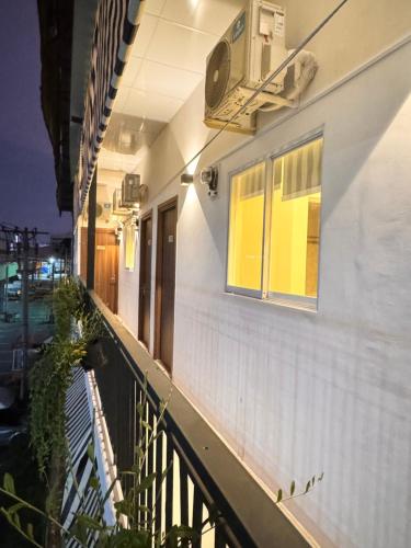 a balcony of a house with a window at Cozy Home Airport - Self check-in 247 in Ho Chi Minh City
