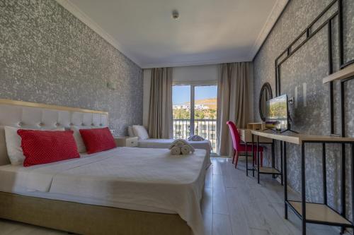 Postel nebo postele na pokoji v ubytování Ladonia Hotels Mio Bianco