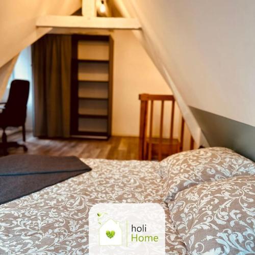 Posto letto in camera con scala. di H11 Petit duplex citadin a Vitré