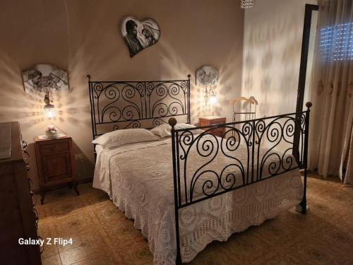 Postel nebo postele na pokoji v ubytování B&b I DUE ANGELI