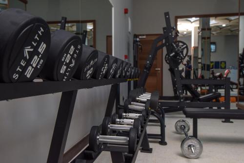 a row of tread machines in a gym at Golden Tulip Zanzibar Airport Hotel & Spa in Zanzibar City
