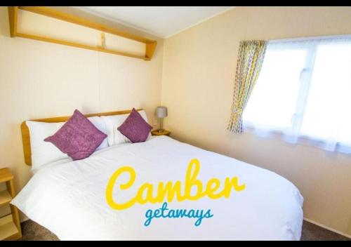 Кровать или кровати в номере SP90 - Camber Sands Holiday Park - Dog Friendly