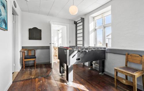 a ping pong room with a ping pong table at 4 Bedroom Gorgeous Home In Vestervig in Vestervig