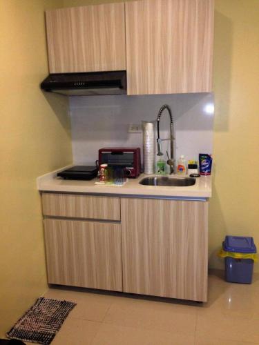 Dapur atau dapur kecil di Moonlight Condo