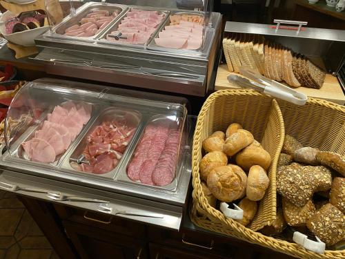 a display of meats and pastries in a bakery at Hotel Altes Winzerhaus in Cochem
