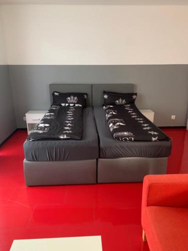 Katil atau katil-katil dalam bilik di Royal Apartments Bremen - Ferienwohnungen & Fahrradverleih