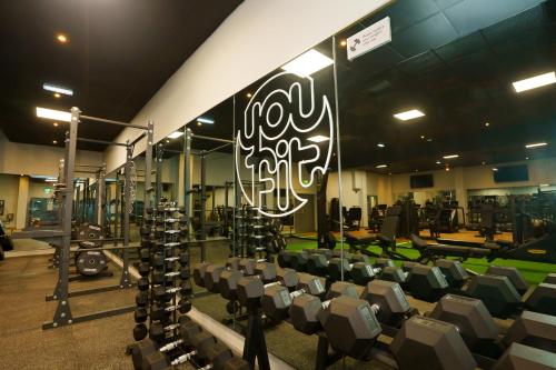 a gym with rows of chairs and a sign at Park hall Hotel & Spa Lancashire, a member of Radisson Individuals in Eccleston