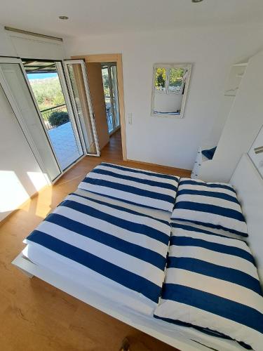 Ένα ή περισσότερα κρεβάτια σε δωμάτιο στο Ferienhaus Gecko