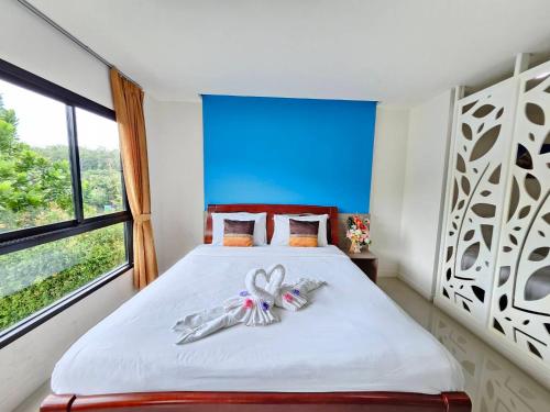 Postel nebo postele na pokoji v ubytování S4 Nai Yang Beach - Near Phuket Airport