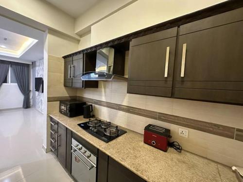מטבח או מטבחון ב-Executive Apartment - 2BHK