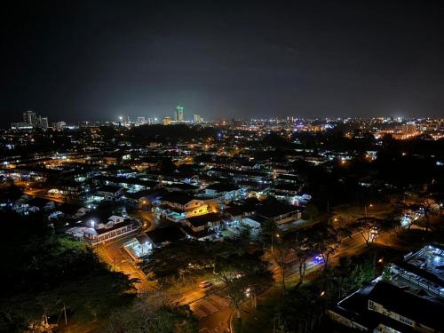 a view of a city at night with lights at A Tower Dream Home in Sibu