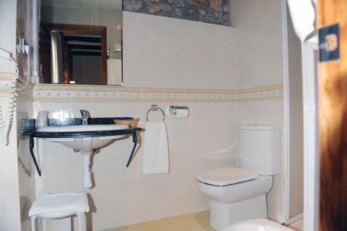 Kúpeľňa v ubytovaní Hotel Restaurant Verdià