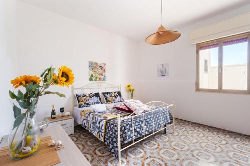 Ένα ή περισσότερα κρεβάτια σε δωμάτιο στο Villa Heart Island Vista Mare