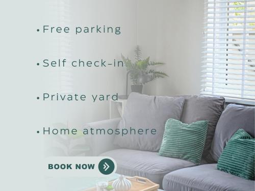 a white couch in a living room with apared at Oakwood park apartment in Kaunas