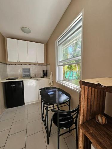 Una cocina o cocineta en Chalet o ptit nid douillet