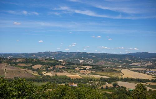 a view of a valley with fields and trees at Cozy Home In Orvieto With Wifi in Orvieto