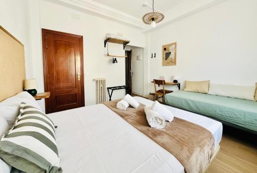 Letto o letti in una camera di Autentic Boutique Moncloa