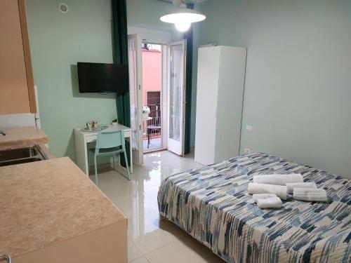 Postel nebo postele na pokoji v ubytování La Casa di Mimma