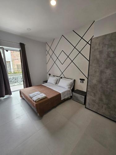 Ένα ή περισσότερα κρεβάτια σε δωμάτιο στο B&B Flair For Life
