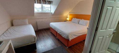 Voodi või voodid majutusasutuse The Fleet Inn toas