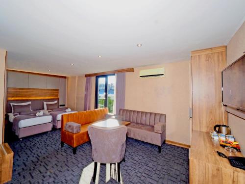 Ένα ή περισσότερα κρεβάτια σε δωμάτιο στο Best House Hotel OLD TOWN