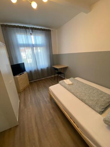 Katil atau katil-katil dalam bilik di Royal Apartments Bremen - Ferienwohnungen & Fahrradverleih