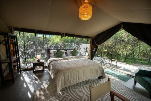 Postel nebo postele na pokoji v ubytování Olkinyei Mara Tented Camp