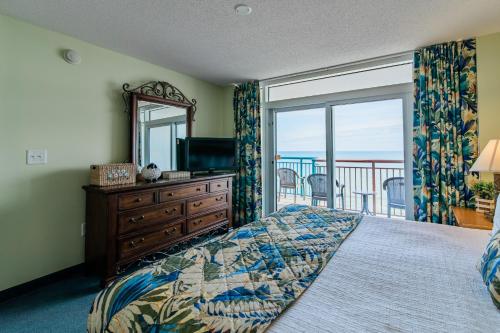 Postelja oz. postelje v sobi nastanitve Paradise Resort, Unit 802, 4 Bedroom, 3 Bath, Direct Oceanfront
