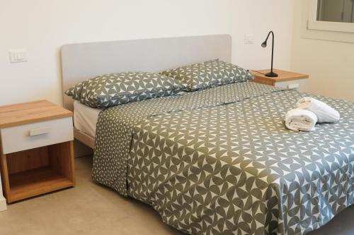 two beds sitting next to each other in a room at Angolo di Paradiso in Mirano