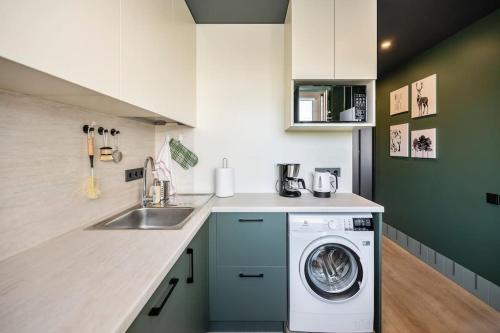 Η κουζίνα ή μικρή κουζίνα στο GoldenHugo Apartment