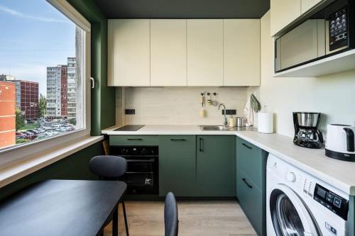 Η κουζίνα ή μικρή κουζίνα στο GoldenHugo Apartment