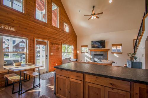 a kitchen and living room with a large counter top at Dover Bay Way in Dover